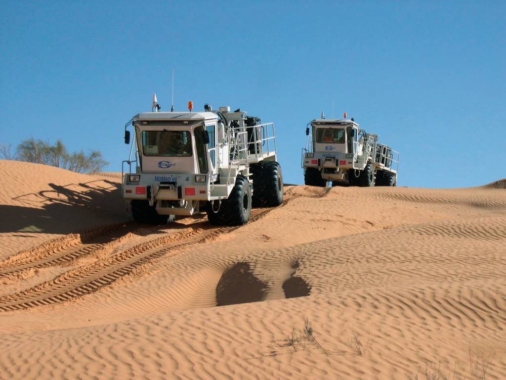 Vibroseis trucks in the desert - Courtesy of CGG